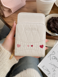 Cream Quilted Mobile Crossbody Wallet – detail view