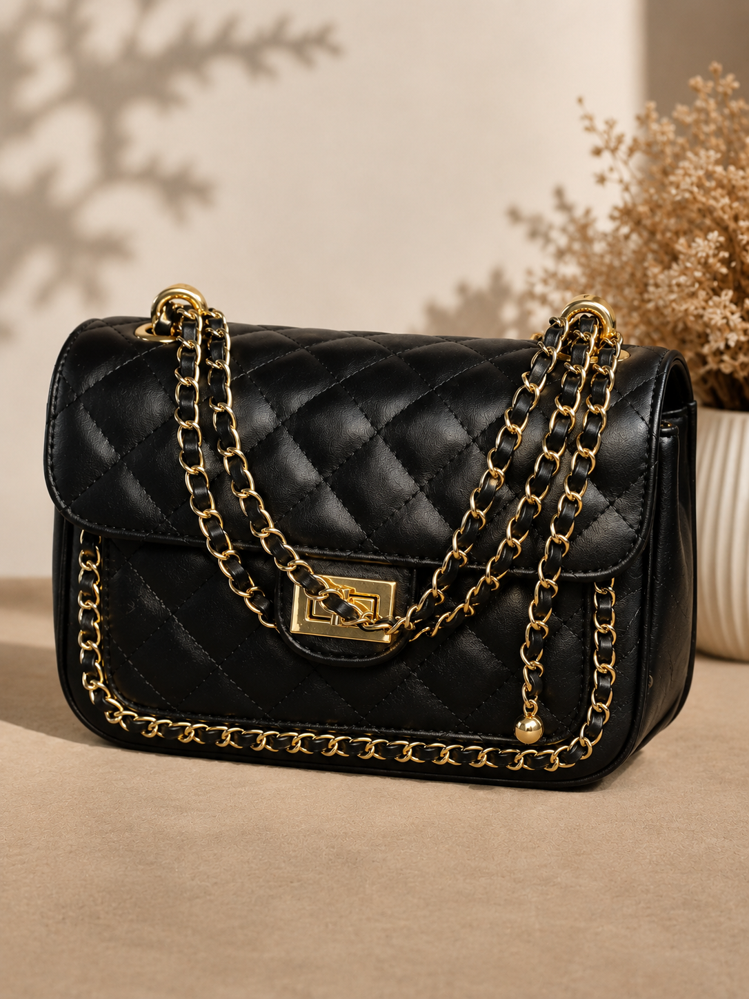 Black quilted chain shoulder bag luxury collection