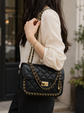 Black quilted chain shoulder bag lifestyle shot