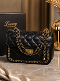 Black quilted chain shoulder bag product shot