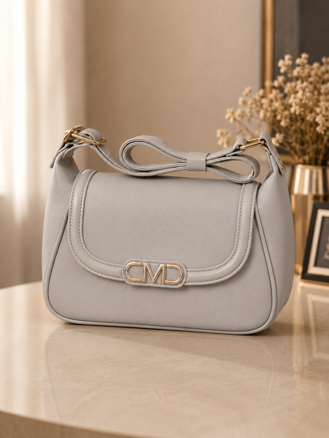 Ivory bow shoulder bag luxury setting