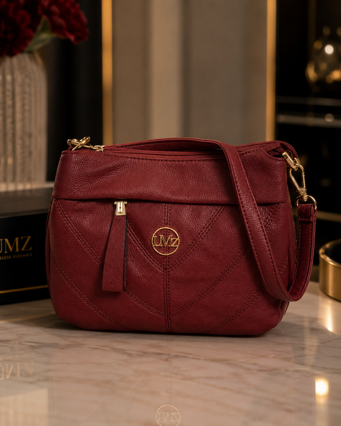 Maroon quilted crossbody bag product shot