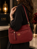 Maroon quilted crossbody bag lifestyle shot