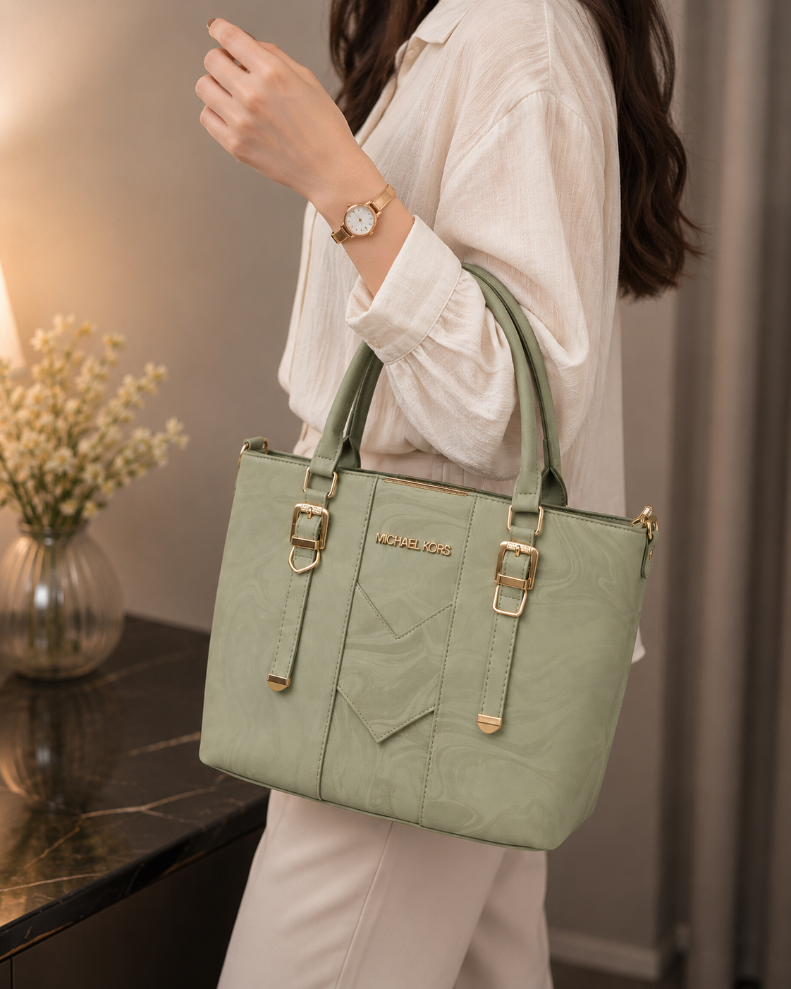 Mint green MK buckle handbag worn on arm